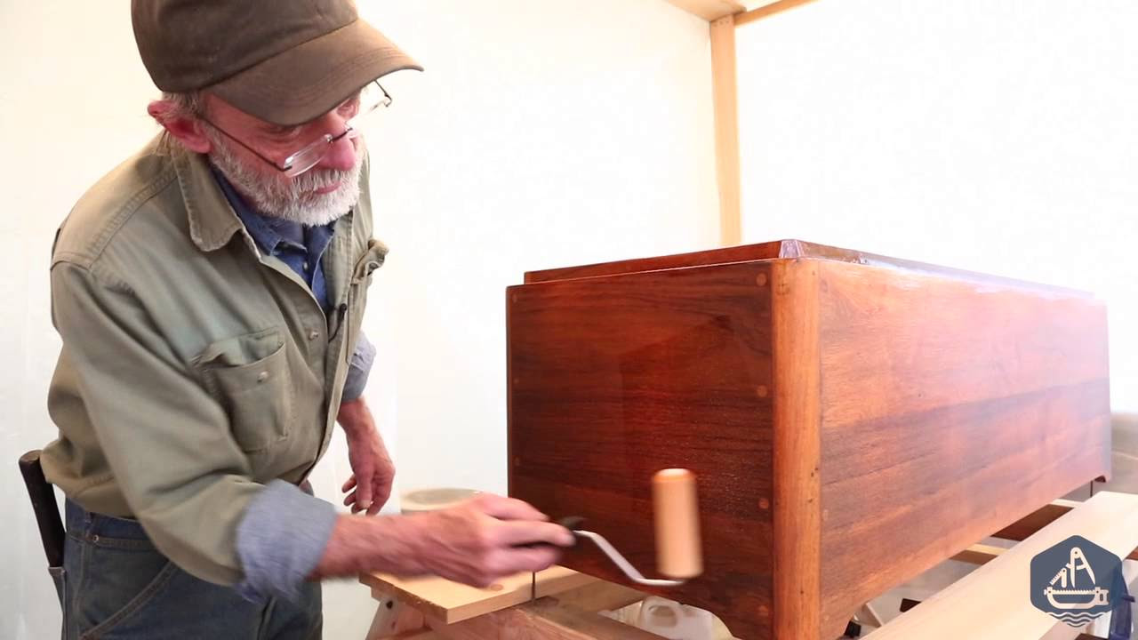 How to roll and tip varnish for wooden boat building - YouTube