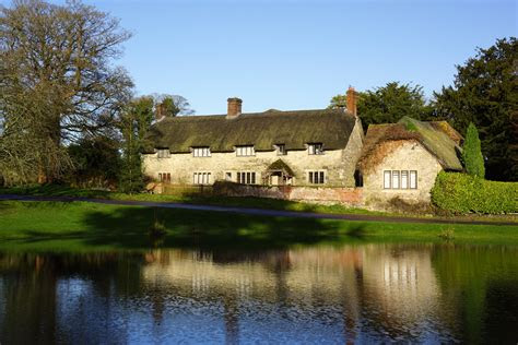 sunday photo   england ashmore pond  thatched
