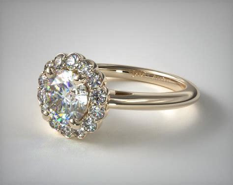 It might seem easier to find a partner and plan a proposal than it is to buy the perfect enga. Floral Halo Engagement Ring | 14K Yellow Gold | James