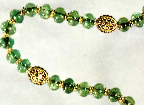 Emerald rosary, detail