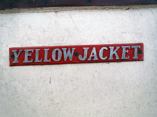 The cast aluminum Yellow Jacket hull badge was replace in 