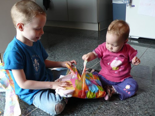 Sparky helps Daisy get the paper off