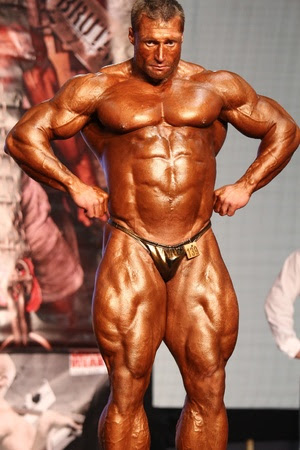 BUDAPEST - NOVEMBER 20: Kormany Mihaly participate in IFBB Champion of the Year 2011 bodybuilding championship Overall category on November 20, 2011 in Budapest, Hungary 
