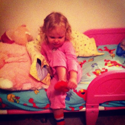 Every night before bed , no matter what, she puts on Captain America socks.