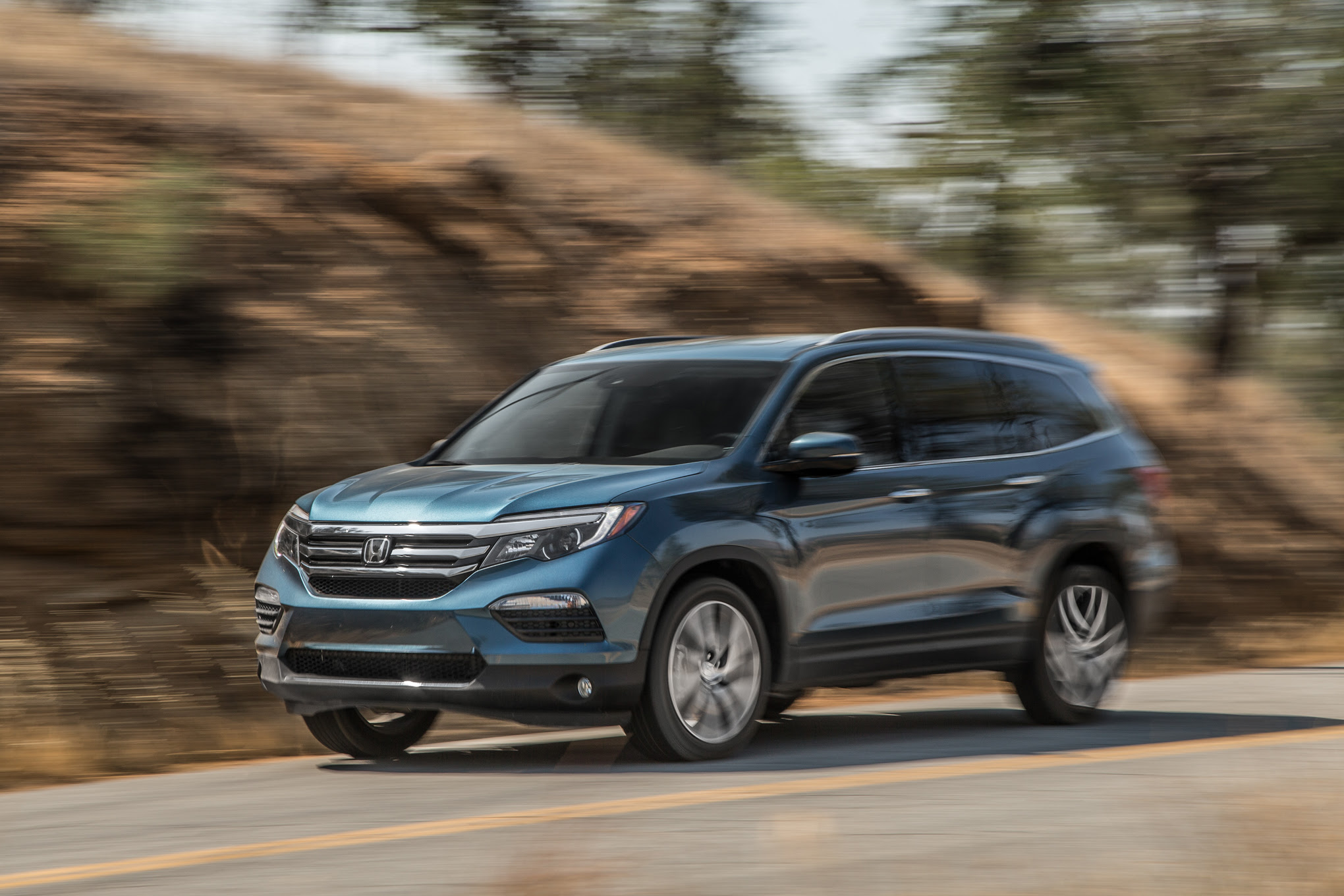 2016 Honda Pilot AWD Elite front three quarters in motion