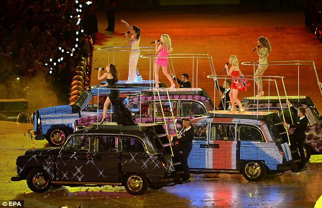 Spice Up Your Life: The Spice Girls arrived on stage in five individually-designed black cabs