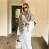 Rosie Huntington-Whiteley rocks Toteme Monogram Wool Cashmere Scarf Tobacco +  Chanel Dad Sandals in Knitwear Ivory for  Selfies Series   #Funke  #FazSeuNomeSkol Gistlover #ASUU AMVCA Trending Ayra Tory Lanez Ed Sheeran #Shameless Oga Bello Jaruma #shola Steve Harvey #RHOBH #FireBoy Atiku Abubakar #LOVEDAMINI #odunlade Nollywood