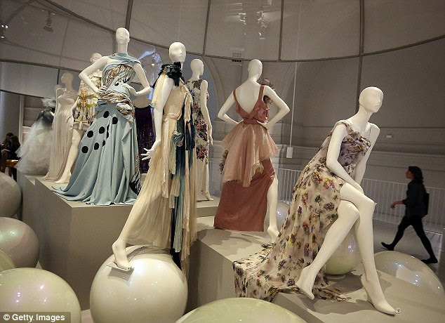 Charting fashion: A vast array of designer dresses inspired by the British ballgown are featured in the show