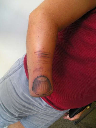 Arm thumb tattoo Getting creative with your handicap