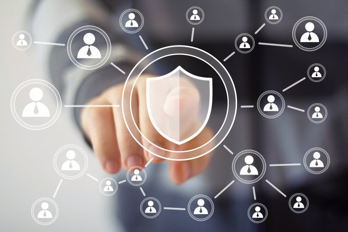 Secure communication diagram. Social network with shield in the middle.