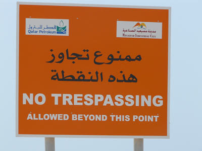 Sign reads: No Trespassing Allowed Beyond This Point