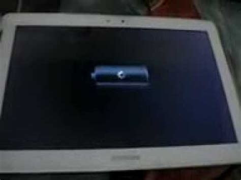 Carefully inspect your device's charging port and remove any debris. samsung galaxy tab 2 10.1 wont charge and turn on - YouTube