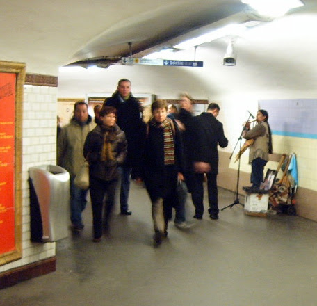 Busker on the Metro
