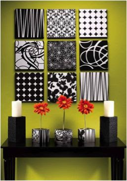 This blog has beautiful DIY ideas that you wouldn't have thought to do before!   I personally love the styrofoam board and candle holders (as seen). The orange daisies really add to it!