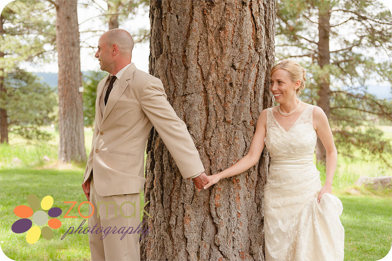 Bride and Groom hold hands moments before their first look at their Seeley Lake Wedding in Montana.