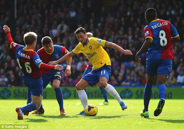 Wizard: Mesut Ozil has continued his fine form at Arsenal following summer switch from Real Madrid