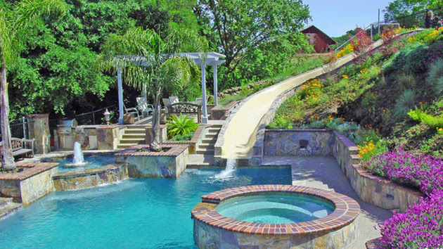 15 Gorgeous Swimming Pool Slides | Home Design Lover