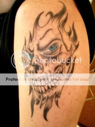 The King of Skull Tattoo Designs