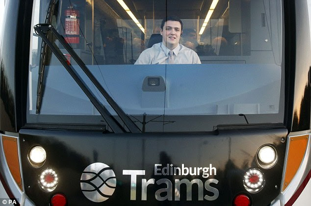 In the driving seat: Craig Scotland sets off for the city centre in the early hours of the morning