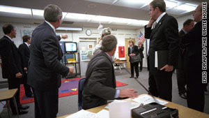 ...as President Bush turns to see the second plane hit the south tower of the World Trade Center.