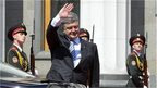 Ukraine"s new President Petro Poroshenko waves after the inauguration ceremony at parliament in Kiev, Ukraine, Saturday, June 7, 2014