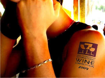 logo tattooed on her arm!