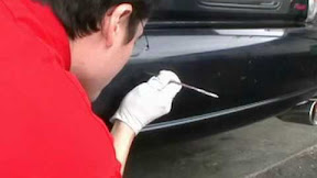 Paint touch up and scratch repair of blue bumper - Applied Colors.
