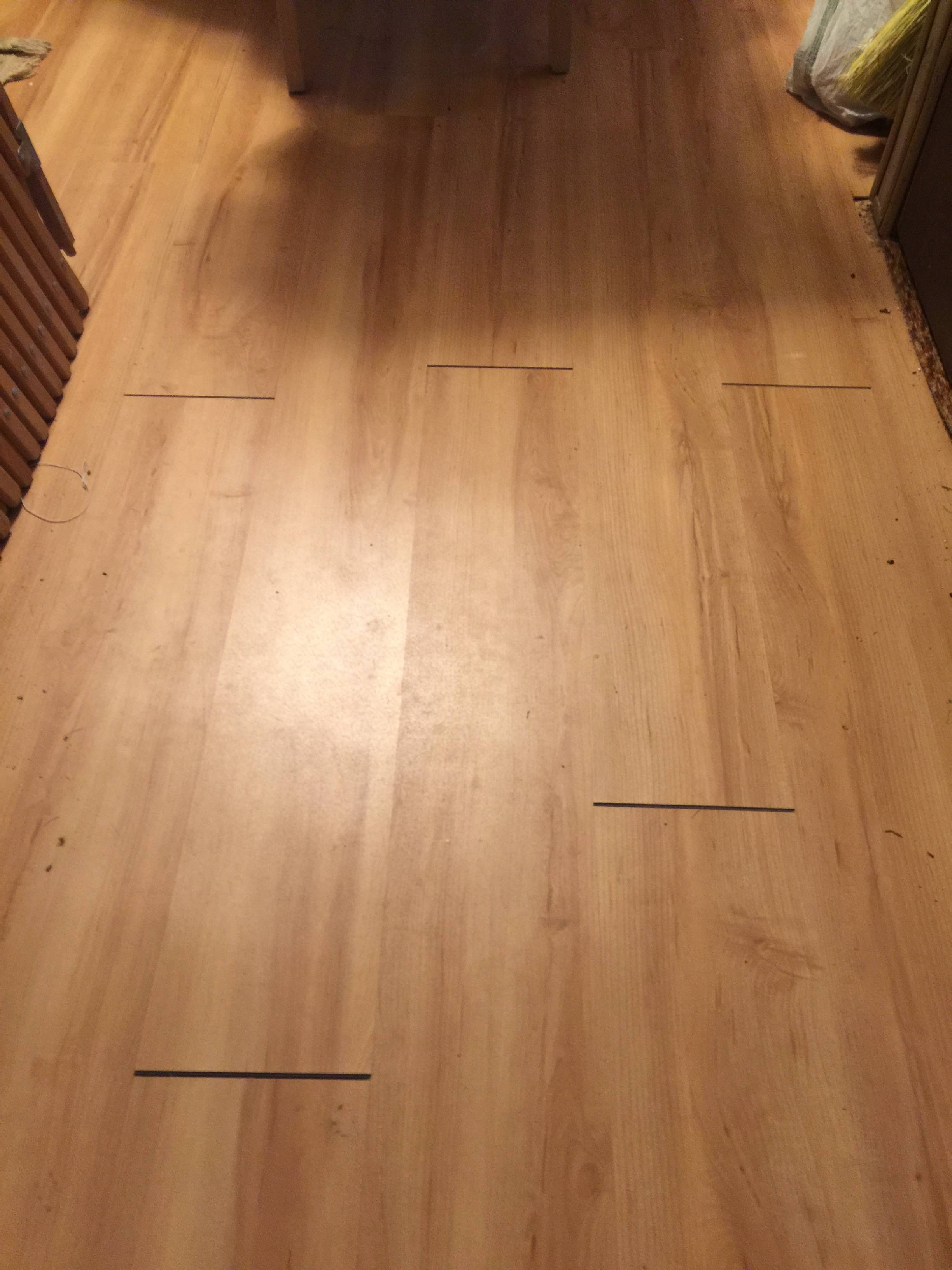 The vinyl plank click flooring I installed in two rooms ...