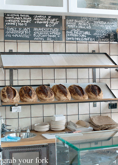 sourdough bread and blackboard menu at brickfields chippendale