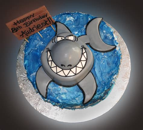 An open kitchen lets customers see exactly what sweet somethings' bakers are up to. Shark Cake - Sweet Somethings Desserts