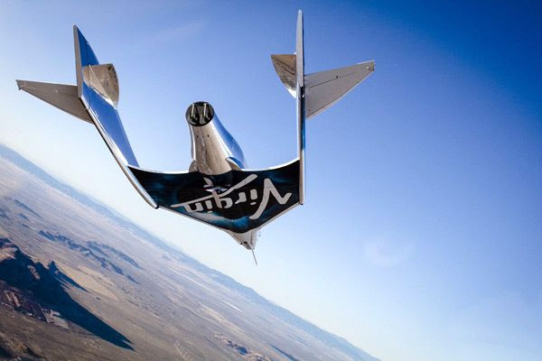 The VSS Unity soars above California's Mojave Desert during her first glide test on December 3, 2016.