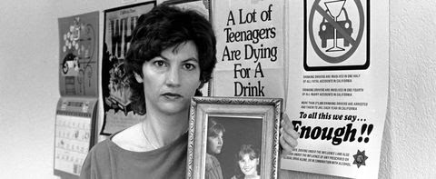 Candy Lightner, president of MADD, Mothers Against Drunk Drivers, holds a picture of her late daughter inside her office in Sacramento, Calif., on Feb. 26, 1981. Lightner's daughter was killed by a drunk driver. (AP Photo)