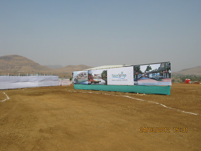 Visit Vascon Nature Springs Villas Row Houses 2 BHK & 3 BHK Flats & Vascon Nature's Nest 1 BHK 1.5 BHK & 2 BHK Flats at Varale near Talegaon Dabhade Taluka Maval District Pune 410 507 - boards at the site