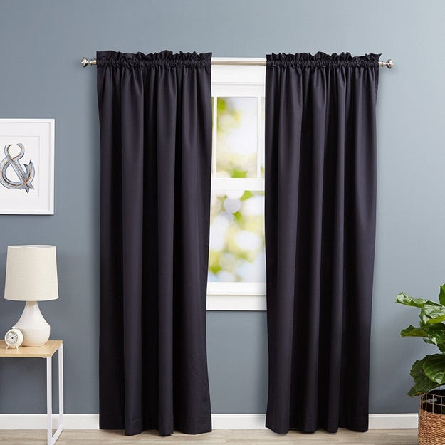 A pair of blackout panel curtains for when your weekend plans do not include waking up in the daytime.