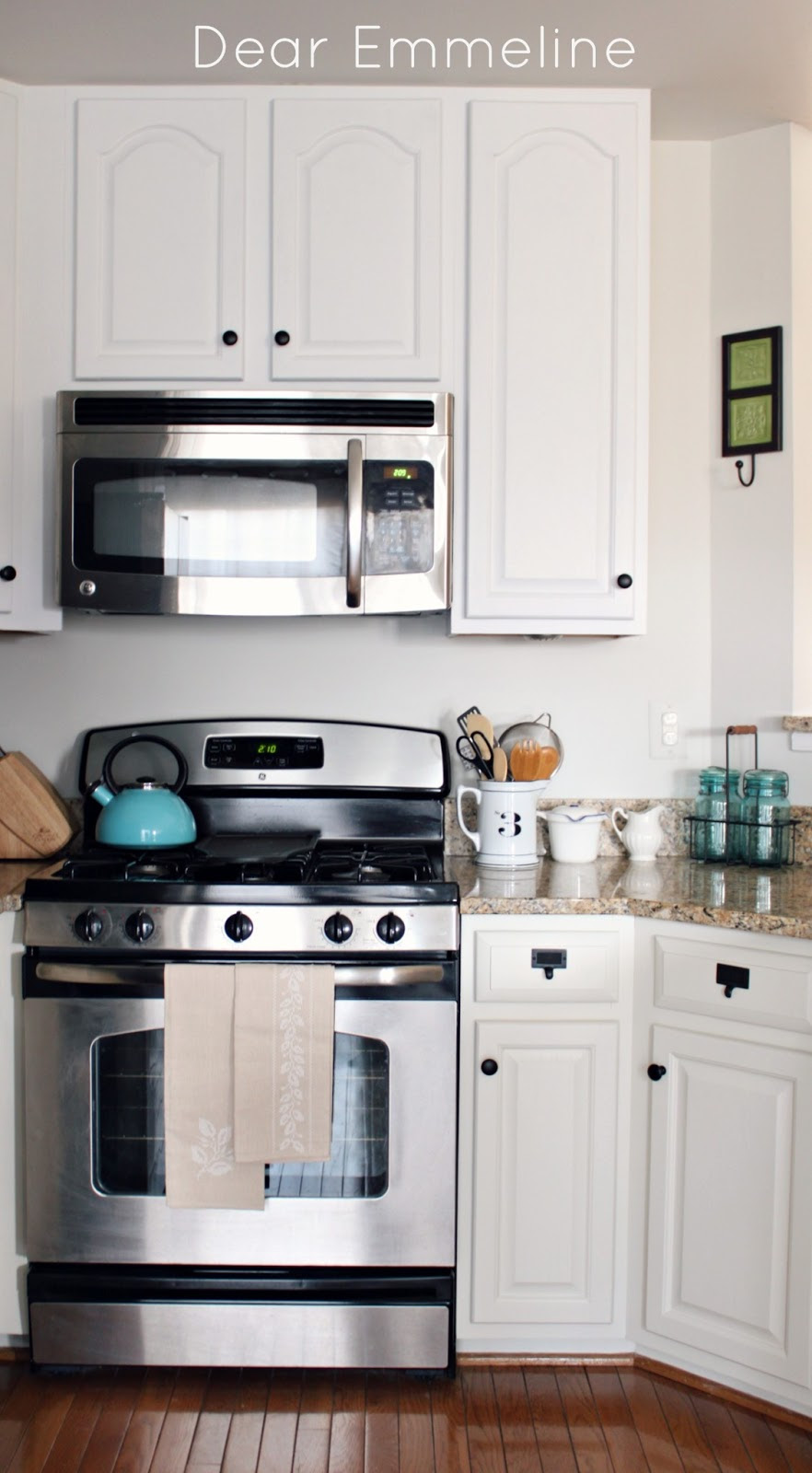 Kitchen Redo: Part Five {Painting the Cabinets with Nuvo Cabinet Paint} Kitchen Redo: Part Five {Painting the Cabinets with Nuvo Cabinet Paint}