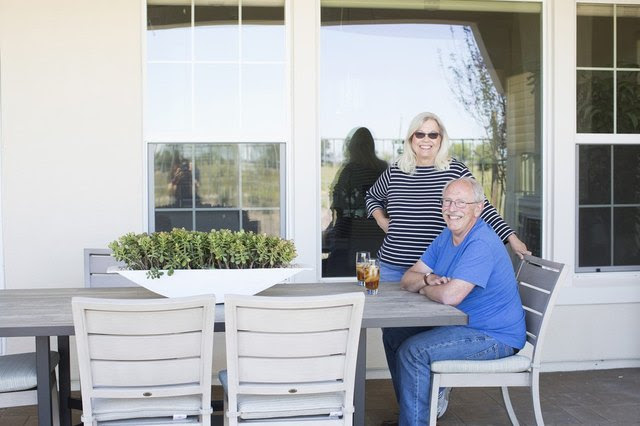 ‘We were looking for somewhere we could walk and bike a lot,’ says Mr. Klein, pictured here with his wife,