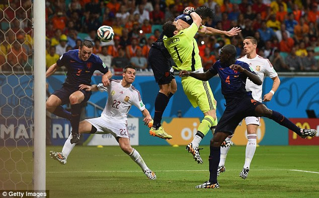 Stefan de Vrij (left) bundles the ball in at the back post for Holland's third goal