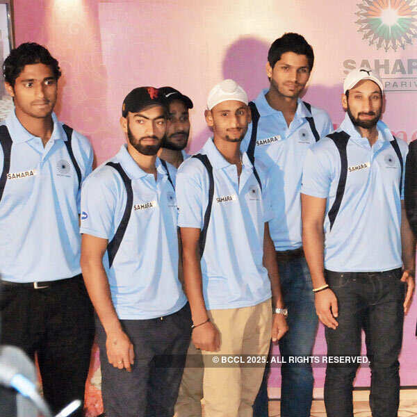 The Indian men's hockey team pose for the shutterbugs during a party hosted by Subrata Roy on the occasion of his grand daughter, Roshna's annaprashan, in Delhi.