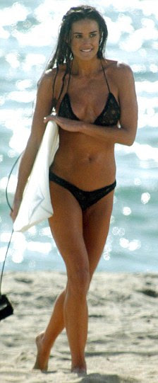Bikini babe: Demi Moore is known for her curvy and toned figure seen on holiday in January and in 2002