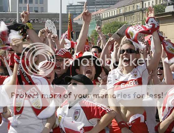 Stuttgart fans observe the Bundesliga match against Energie Cottbus on a screen at the public viewing area \'Schlossplatz\' in Stuttgart, Germany Pictures, Images and Photos