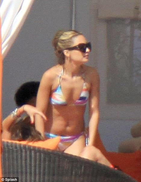 Yummy mummy: The mother-of-two is in the Florida city for the launch of a new line from her Winter Kate fashion range 