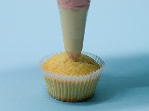 Piping swirls on cupcakes 1