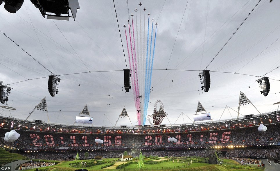 And they're off: At 20:12 the Red Arrows flew over the Olympic Stadium as excitement reached fever pitch ahead of what proved to be a remarkable show