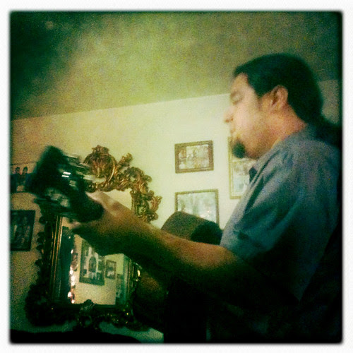Frank accompanying the kids on guitar