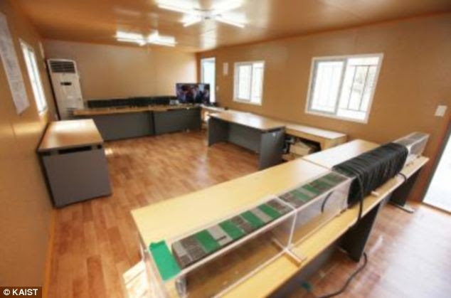 Korean researchers have unveiled an experimental wireless recharging system that could top up the mobile of everyone in the office