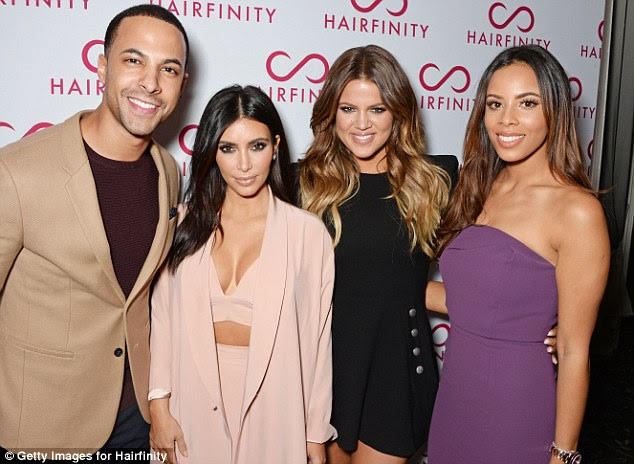 Beautiful foursome: Marvin and Rochelle Humes cosied up to the Kardashian sisters 