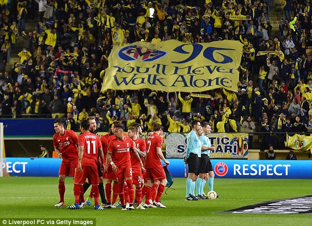 Villarreal supporters unfurl a flag in tribute to the 96 fans who died in the Hillsborough disaster in 1989