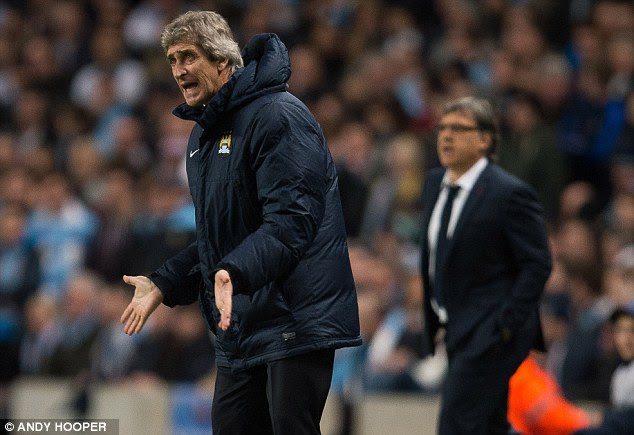 Unhappy: UEFA took action after Manuel Pellegrini's comments following Man City's defeat to Barcelona
