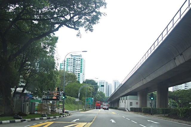 television crew and media setting up shop along the route of Lee Kuan Yews state funeral procession from Parliament House to the University Cultural Centre