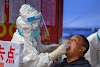 China under-reported number of coronavirus cases, Chinese medical advisor says
